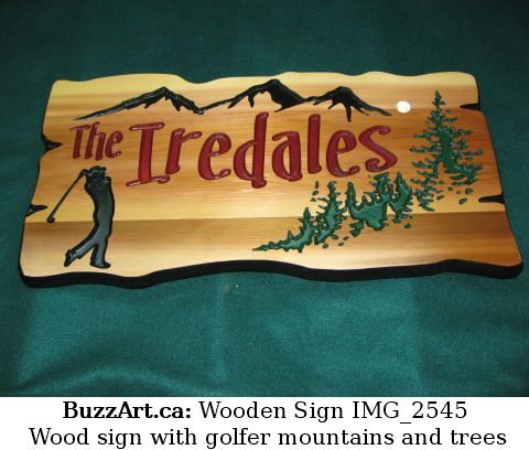 Wood sign with golfer mountains and trees